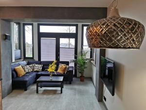 Χώρος καθιστικού στο Apartament nr 2 w Starym Nadleśnictwie