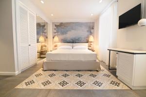 Posteľ alebo postele v izbe v ubytovaní Borelli Palace & Borelli Blue