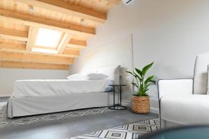Posteľ alebo postele v izbe v ubytovaní Borelli Palace & Borelli Blue