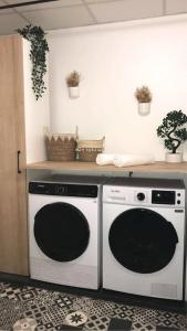 Kuchyňa alebo kuchynka v ubytovaní Charmant appartement avec terrasse et parking - Centre ville