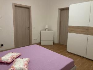 Postel nebo postele na pokoji v ubytování Due Magnolie