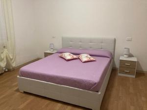Postel nebo postele na pokoji v ubytování Due Magnolie