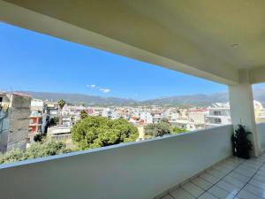a balcony with a view of a city at KAPA Central Apartment in Kalamata