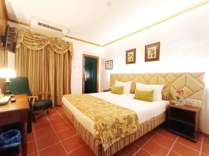 Katil atau katil-katil dalam bilik di El-Rei Dom Manuel Hotel