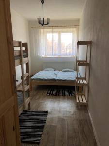 Postelja oz. postelje v sobi nastanitve Nutilova chalupa