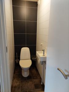 Baðherbergi á Sandaholm Camping, Bad och Restaurang
