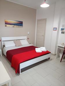 Postel nebo postele na pokoji v ubytování B&B Solarium