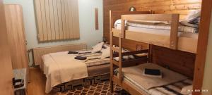 Postel nebo postele na pokoji v ubytování Apartma Arh