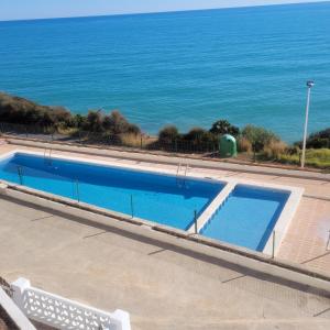 Bazén v ubytování Adosado frente al mar casa kiko nebo v jeho okolí