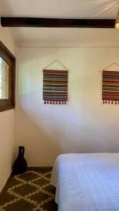 A bed or beds in a room at Habitación Rancho Las Moras