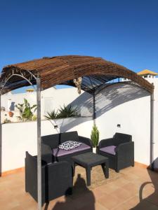 Patio lub wspólna przestrzeń na świeżym powietrzu w obiekcie L' Azotea del Sol appartement typique