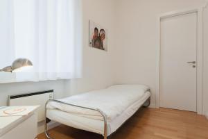 Ein Bett oder Betten in einem Zimmer der Unterkunft Hotel Monte Verità