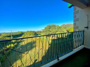a balcony with a view of the mountains at The Ultimate Escape - Backup Electricity in Gaborone