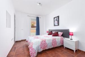 A bed or beds in a room at La flor del Atlantico