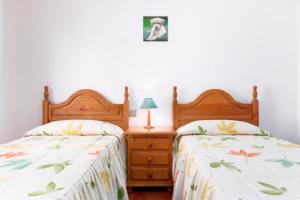 A bed or beds in a room at La flor del Atlantico