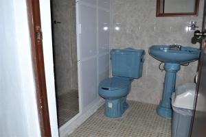 Koupelna v ubytování Orquídeas Hotel + 27 fotografií