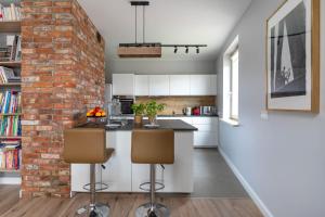 Kuchyňa alebo kuchynka v ubytovaní Apartament 160m2, 500m od Starówki