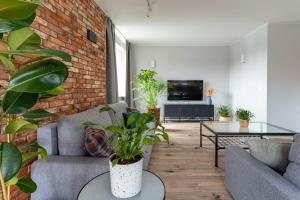 Televízia a/alebo spoločenská miestnosť v ubytovaní Apartament 160m2, 500m od Starówki