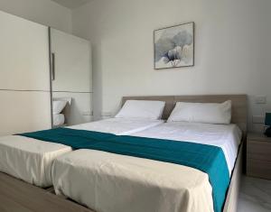 Ένα ή περισσότερα κρεβάτια σε δωμάτιο στο Condo with Patio overlooking Piazza