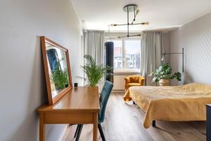 Televízia a/alebo spoločenská miestnosť v ubytovaní Apartament 160m2, 500m od Starówki