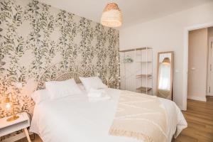 Ένα ή περισσότερα κρεβάτια σε δωμάτιο στο El Refugio de Sabina - Sierra de Gredos