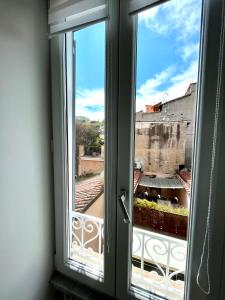 A balcony or terrace at TRASTEVERE URBAN SUITE