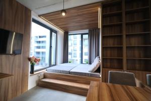 TV a/nebo společenská místnost v ubytování Legnicka Business Apartments