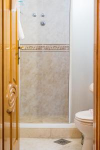Koupelna v ubytování Garni Hotel MB