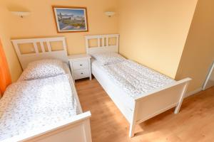 Postel nebo postele na pokoji v ubytování Ferienwohnung Gesien