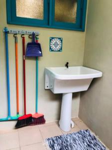 Koupelna v ubytování Morada Bromélias praia da Ferrugem + 7 fotografií