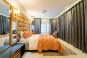 Ένα ή περισσότερα κρεβάτια σε δωμάτιο στο 3-Bedroom SmartHome Luxury Apartment +61 φωτογραφίες