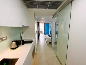 Kuchyň nebo kuchyňský kout v ubytování Sands Condo Studio 015 by ThaiminatorPattaya