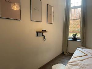 Postel nebo postele na pokoji v ubytování Appartement hyper centre 1