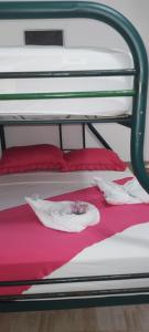 Postel nebo postele na pokoji v ubytování Cabinas Smith