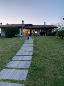 a walkway in front of a house at Casa Vacanze AL CAPRIANO appartamento Mora in Cantello