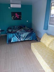 Rangi Pearl Lodge客房内的一张或多张床位