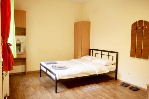Posteľ alebo postele v izbe v ubytovaní Doba In Ua Studio Irpin Apartments