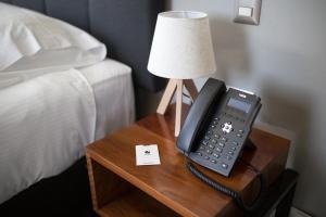 Rúm í herbergi á Hotel Enjoy Pucón