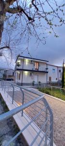 a house with a fence in front of it at Sweet Home Simona in Zambrone