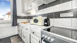 Fotografia z galérie ubytovania HOMEY Coloc goodLife - Colocation moderne - Chambres privées - Wifi et Netflix - Au pied du tram pour Genève v destinácii Ambilly
