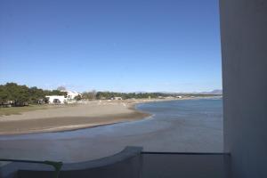 a view of the beach from a balcony at Sea Star Apartments in Ulcinj