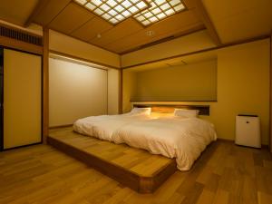 Postelja oz. postelje v sobi nastanitve Japanese Onsen Ryokan Kohakuen