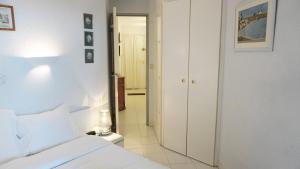 Łóżko lub łóżka w pokoju w obiekcie Appartement 556, Vue Mer et piscine By Palmazur Vacances