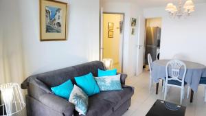 Część wypoczynkowa w obiekcie Appartement 556, Vue Mer et piscine By Palmazur Vacances