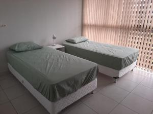 Cama o camas de una habitación en Miradores del Chaco