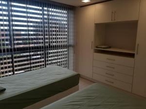 Cama o camas de una habitación en Miradores del Chaco