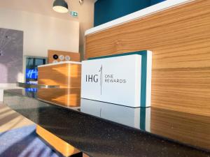 a door with a box on top of a counter at Holiday Inn Express - Ankara - Airport by IHG in Ankara