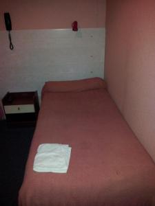Кровать или кровати в номере Hôtel du Terrage
