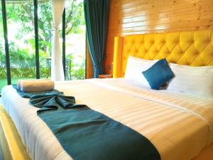 Postel nebo postele na pokoji v ubytování Moly Resort