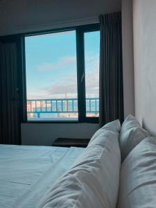 Postel nebo postele na pokoji v ubytování Lugo Hotel
